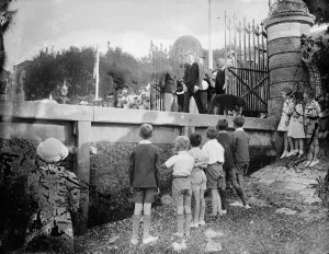 Children have close up view of the king at Cowes. The King boards the Royal Yacht Victoria