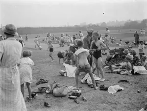 Children enjoying the paddling pool, Dartford, Kent. 1937