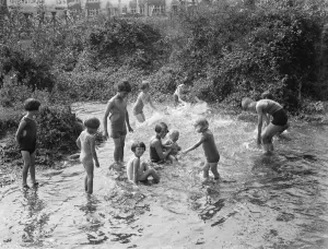 Playing Prints: Children enjoying the paddling pool in St Mary Cray, Kent. 1936