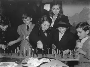 Candle Prints: Children lighting candles at the Sidcup Congregational Church Christmas Bazaar, Kent