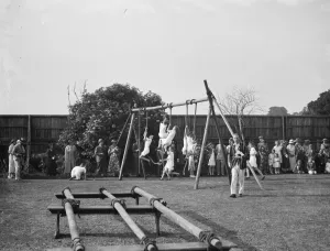 Parents Prints: Children at Pennthorpe School in Chislehurst, Kent, climb the ropes during demonstration