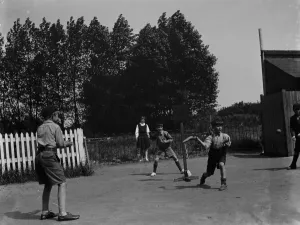 Playing Prints: Children playing a game of stoolball in Hartley, Kent. 1937