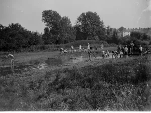 Playing Prints: Children playing in the stream. 1935