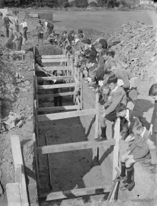 Children at school in Sidcup, Kent, during wartime. Here they are watching