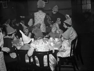 Eating Prints: A childrens party at the Working Mens club in Sidcup, Kent. 1938