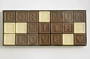 Milk Prints: Chocolate letters spelling For Mum with love in cellophane box as Mothers day