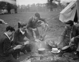 Tent Prints: Chopping wood ( with a kukri, Nepalese knife ) and cooking around the camp fire