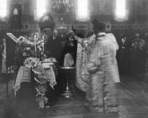 The christening of the daughter of Prince and Princess Bibesco, The officiating priest