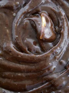 Shiny Prints: Close up of chocolate muffin dough mixed and ready for baking credit: Marie-Louise