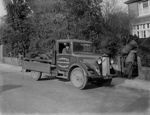 Coal delivery by one of the coal vans from T Denness, Coal and Coke Merchants in