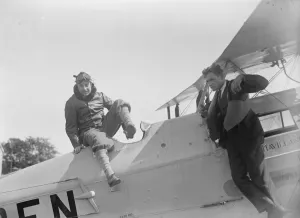 Cobham wins great air race Cobham and his mechanic leaping from their machine immediately