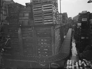 Collins brothers building company. Their rebuilding scheme of the local bottle factory