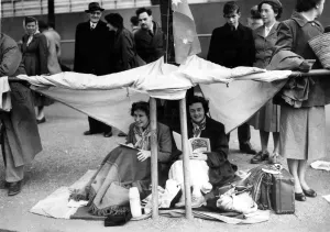 Royal Prints: Complete with their tent in the mall this morning are Miss Betty Simpson and Miss