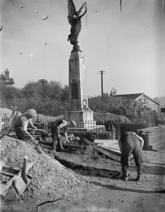 The construction of an Air Raid Precautions shelter beneath a war memorial in Swanley