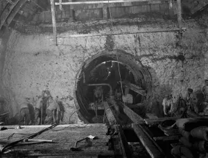 Scaffolding Prints: The construction of the Dartford Tunnel. Workers building the main tunneling shield