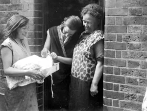 Cooking dinner at Limehouse, London. 1933