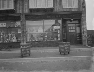 Corner shop in Chislehurst, Kent. An off - licence selling wines, spirits and beers
