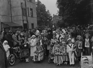 Fancy Dress Prints: The Coronation Carnival through the street of Stone, Kent, to celebrate the coronation
