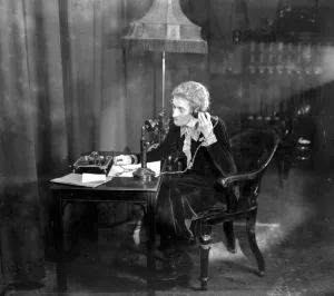 The Countess of Oxford and Asquith (posing for the film series, Secrets of Handwriting )