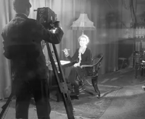 The Countess of Oxford and Asquith (posing for the film series, Secrets of Handwriting )