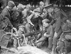 Cpl showing the civilian guests how to use a machine gun. 15 young men from south