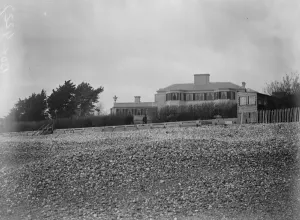 Exterior Prints: Craigwell House, Aldwick, Sussex. a view from the sea front showing a policeman