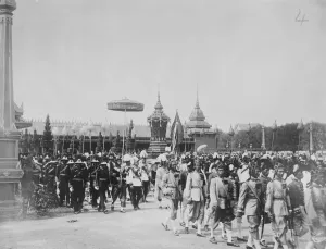 Cremation of late King of Siam. The golden urn in the course of being carried round