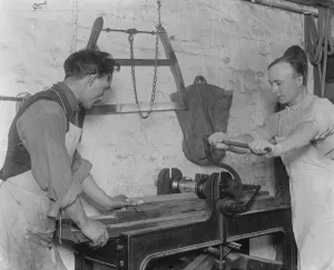 Wood Prints: Cricket Bat Making at John Wisdens Pressing a blade to harden it, several tons