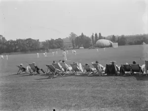 Playing Prints: Cricket in Eltham, Kent. A barrage balloon can be seen in the background