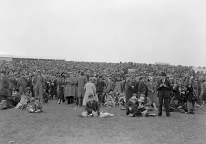 Crowd and Picnic Parties on Thundle Hill at Glorious Goodwood Racecourse, West Sussex