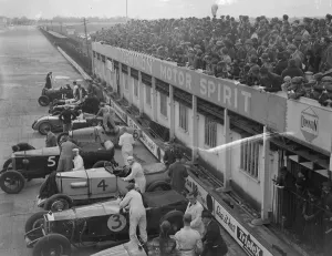 Crowds throng Brooklands for great Easter opening meeting. Easter holiday crowds