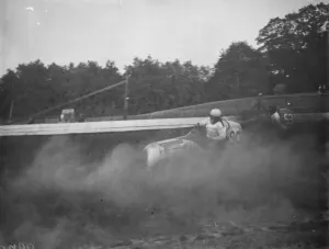 The Crystal Palace miniature car racing grand prix. Frank Chiswell skids his car