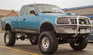 Truck Prints: A customized Ford F150 with big wheels and tyres outside a Dairy Queen fast food
