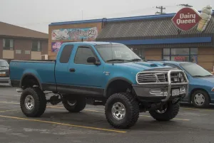 Truck Prints: A customized Ford F150 with big wheels and tyres outside a Dairy Queen fast food
