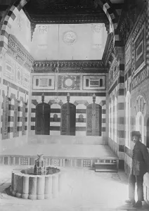 Damascus in ruins : Sensational Arab report. The Azm Palace, the reception room