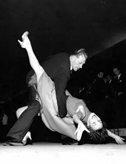 Couple Collection: Dancing the jive or jitterbug 1950s dance / dancing / party season / celebration