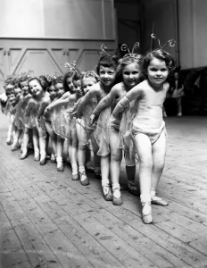 Dancing in the Rain April 11th 1954 Thoroughly enjoying themselves as butterflies