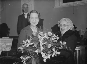 The Dartford Carnival Queen is handed a bunch of flowers by the Mayoress