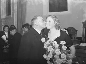 The Dartford Carnival Queen Miss Joan Tompkins receiving a kiss from the Mayor of