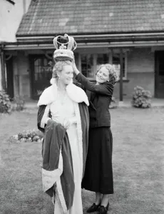 Crown Prints: The Dartford Carnival queen trys on the queens gown. 1938