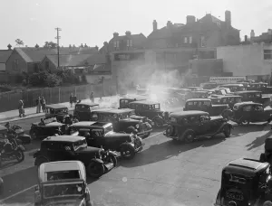 Automobiles Prints: The Dartford Carnival. Spectators cars parking to see the procession