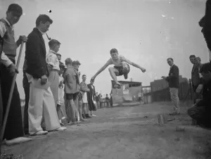 Sporting Prints: Dartford technical college sports. Caught in mid air during the long jump