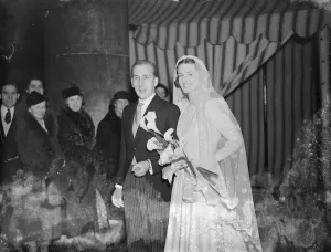 Daughter of famous conductor married at St Georges, Hanover Square. Medieval wedding gown