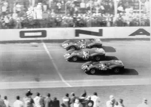 Cars Prints: Daytona Beach, Florida: Spectators line both sides of the Daytona Beach race track on March 5th