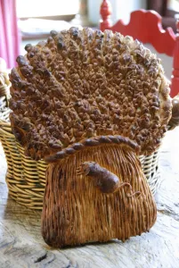 Decorative loaf in shape of sheaf of wheat with mouse for harvest festival credit