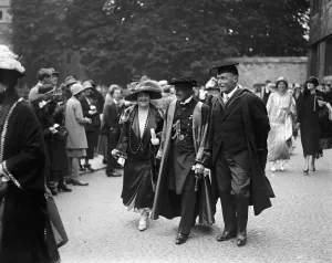 Degrees conferred at Oxford. Admiral Earl Jellicoe leaving with his wife. 24