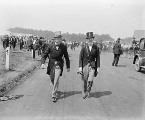 Derby Day at Epsom. The Earl of Shaftesbury walking on the course with a friend