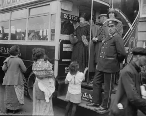 Derby Day Mrs Asquith and her party arriving by a St Dunstans motor bus, are