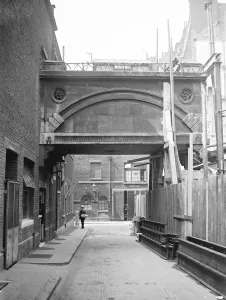 Demolition Prints: Difficulties of demolishing a quaint London bridge. Standing at the back of