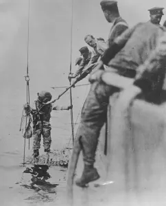 Copper Helmet Prints: Diving operation on sunken submarine This official photo from the US Navy shows